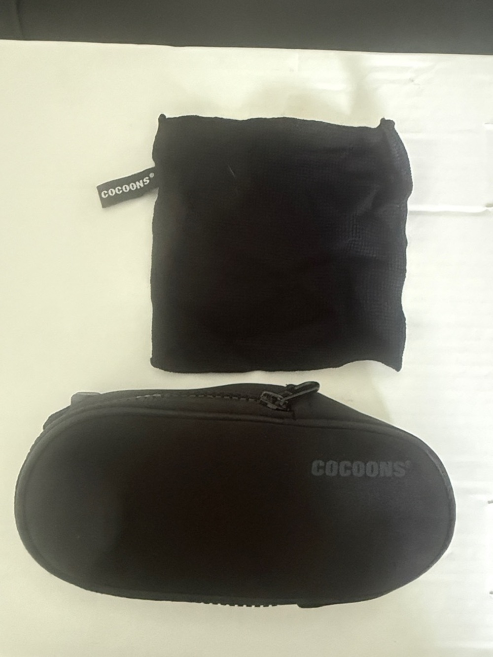 COCOONS Black Zippered Eyewear Case with Soft Cleaning Cloth.